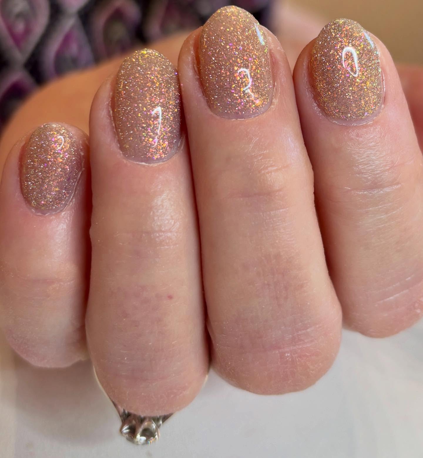 Subtle nude with a galaxy of sparkle ✨
Proof that classy nails never go out of style 💫

Appointments available 🤍

#nailinspo #sparklenails #northamptonnails #northamptonnailtech #northamptonnailsalo